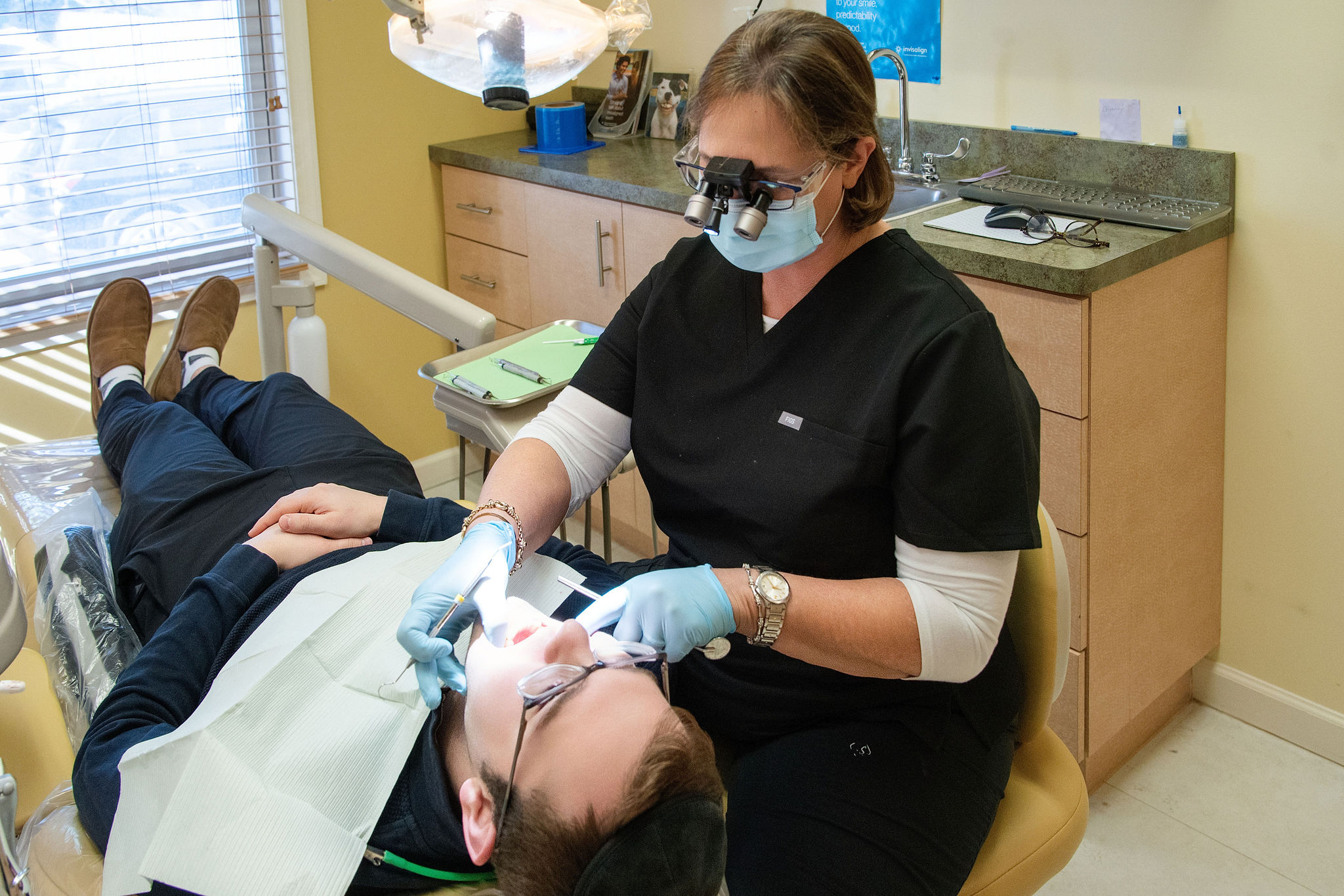 Dr. Kreitman performing a routine dental procedure